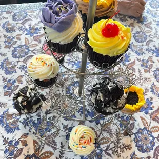 cherry sundrop, oreo, and vanilla cupcakes