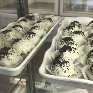 two trays of cupcakes