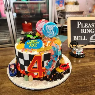 Car and candy themed birthday cake