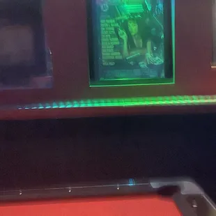 a neon lit poster on the wall