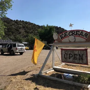 a sign for ice cream open