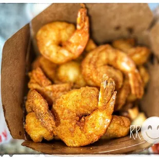 a basket of fried shrimp