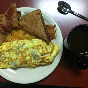 A mushroom and swiss omelette with hashbrowns and two pieces of toast ($5.95) + coffee ($1.50).