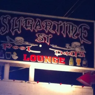 a neon sign for a bar