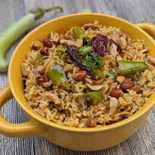 a bowl of rice and vegetables