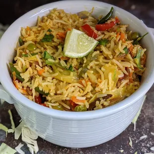 a bowl of rice and vegetables