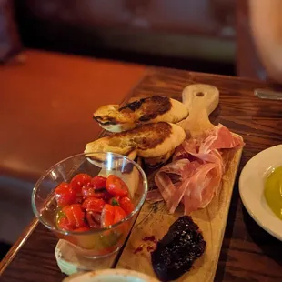 a variety of food on a wooden table