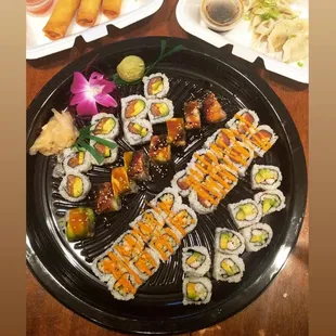 Vegetable spring rolls, steamed vegetable gyoza, and Maki Tray S1