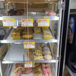 a display case full of pastries