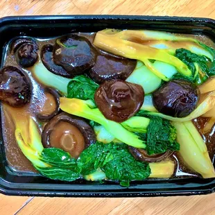 Black Mushroom with Tender Greens $11.25