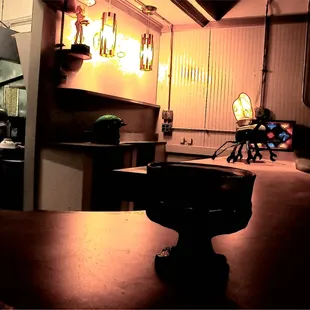 a toilet in a dimly lit room