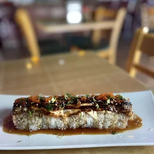 a plate of sushi on a table