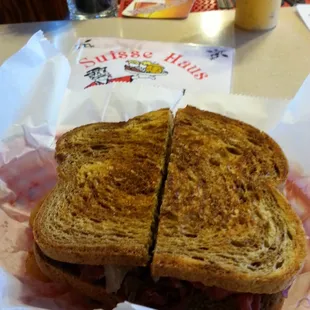 Corned Beef Reuben atop Fried Cheese Curds