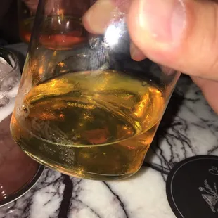 a person holding a glass of wine