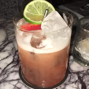 a close up of a drink in a glass