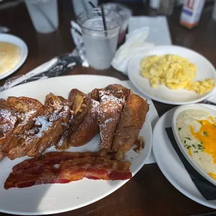 Banana foster french toast, eggs and cheese grits. All very good! The grits were some of the best I&apos;ve ever had!