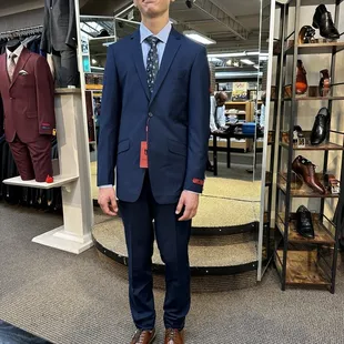 First suit, and he's pretty pleased about it. $200 for the suit, $50 for the shoes, $35 each for the shirt and tie.