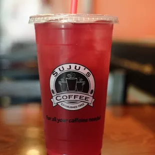 a red cup with a straw