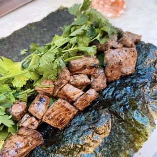 a close up of a piece of sukkabi