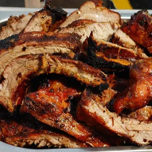 a plate of barbecued meat