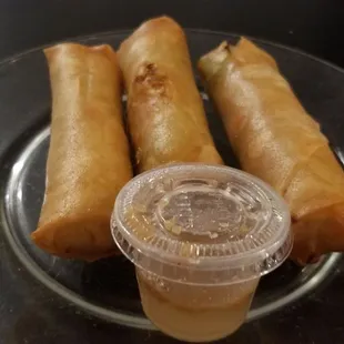 Spring rolls with a tasty peanut/sugary sauce