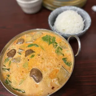 a bowl of rice and a bowl of soup