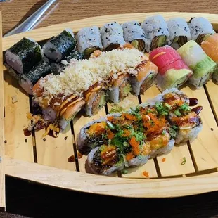 Amazing sushi that they plated on a boat!