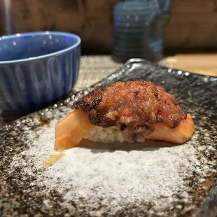 King salmon with torched Roma tomato