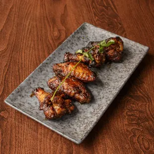 Chicken wings baked in our Clay oven with a flavorful tamarind based sauce!