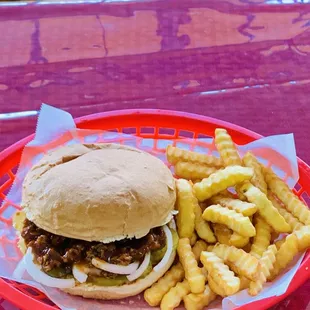 a plate of french fries and a hamburger