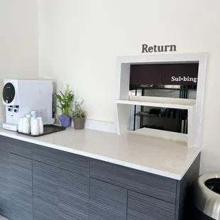 Tray return