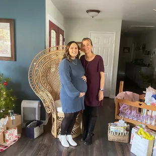 The whicker chair. They have it natural or white  Really cute for mama to be to open gifts in