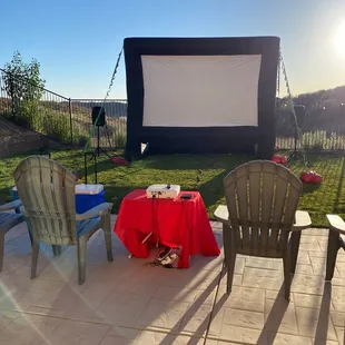 Movie screen inflatable with projector.