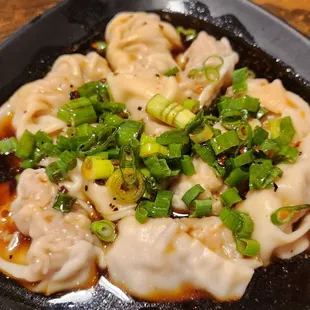 Pork Wontons in Spicy Sauce - the star of the show! Mild spice. That sauce is so good we also put it on our other dishes.
