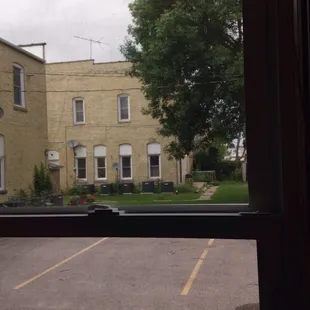 a view of a parking lot through a window