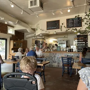 Dining room super casual for menu - could use some mood lighting or fancier decor for what they&apos;re serving IMHO