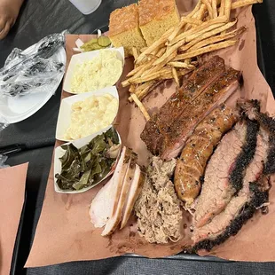 Ribs were evenly smoked and flavorful, but a little dry for my taste, collard greens had enough pork in for the saltiness.
