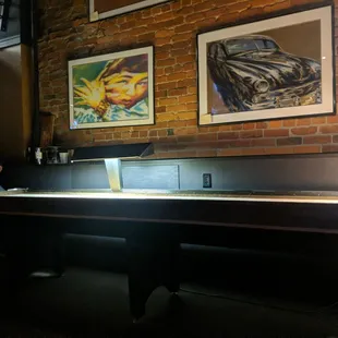a man standing at the bar