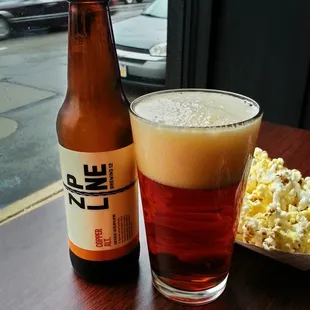 Rainy day after work, enjoying Zipline Copper Alt, one of Nebraska&apos;s better beers.