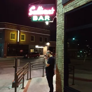 Friend lighting one up