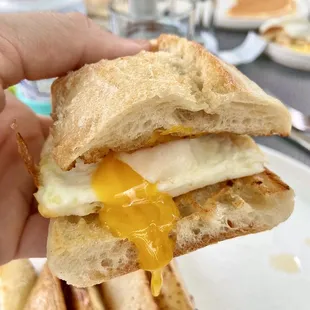 Breakfast Sandwich with runny egg and apricot jam.