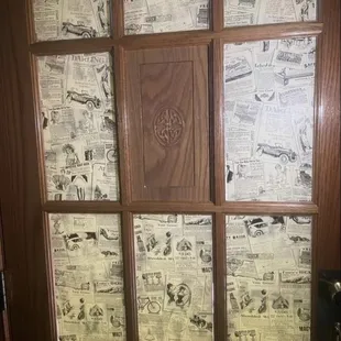 The unmarked entrance on the 2nd floor