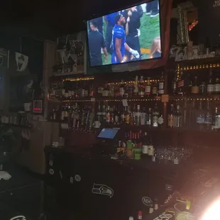 Big TV behind the bar.