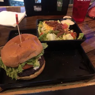 Burger and side salad
