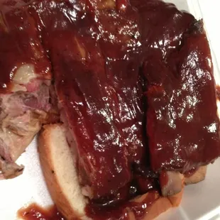 Half slab of ribs with sweet sauce.