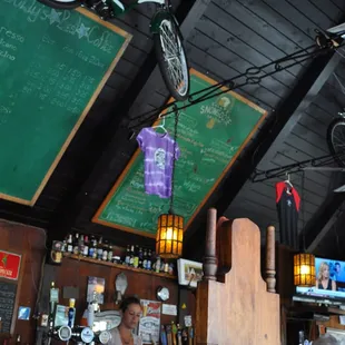 a bicycle hanging from the ceiling