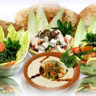 side hummus , salads and Feta