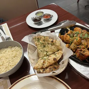 86. Garlic Naan, Chutneys, Rice, 24. Mix Grill