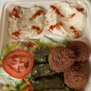 a meal in a styrofoam container