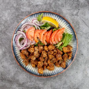 Calf's Liver
Albanian-style fried calf's liver, served with sautéed onions and seasoned with tangy sumac for a bold and flavorful dish